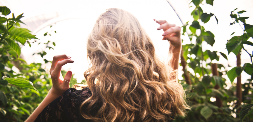 Woman with blonde hair outdoors